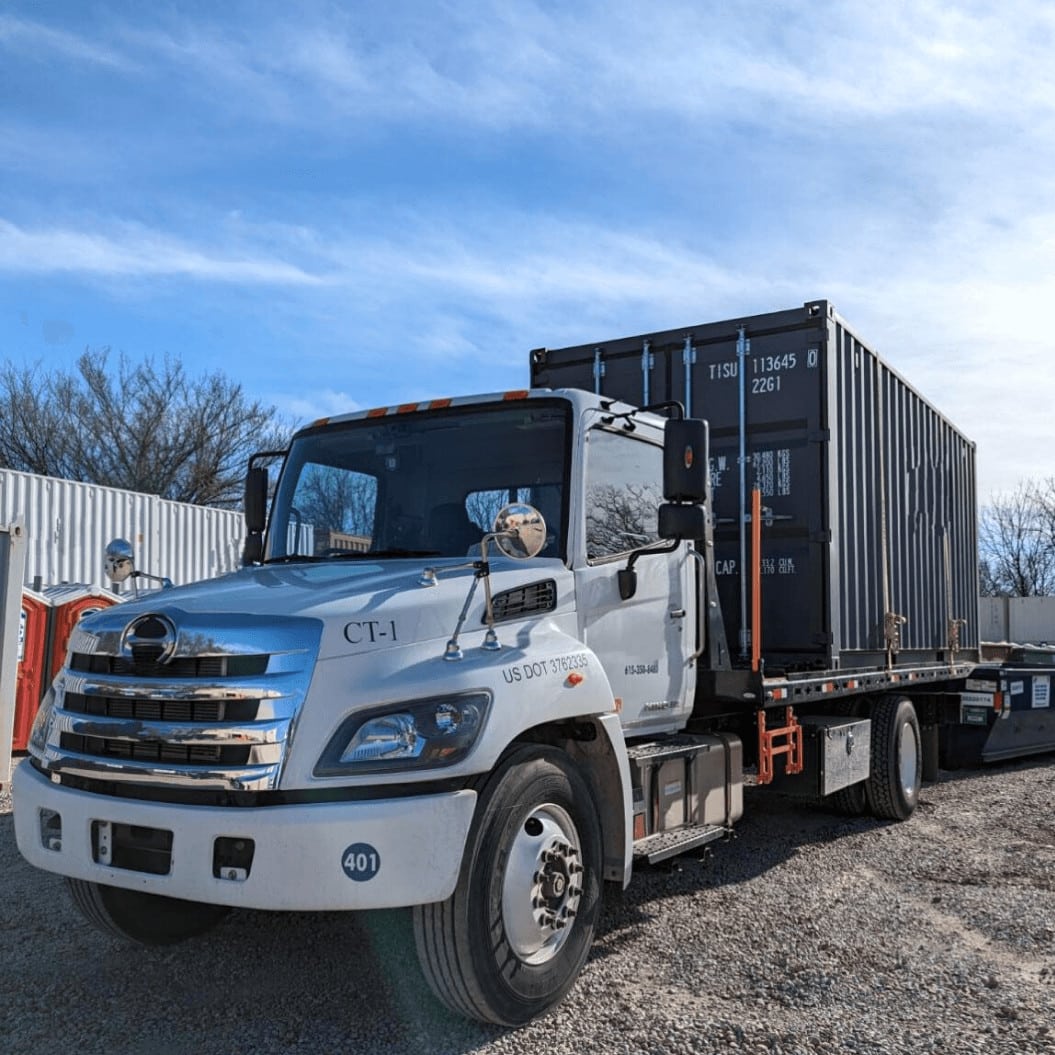 Truck for storage container delivery