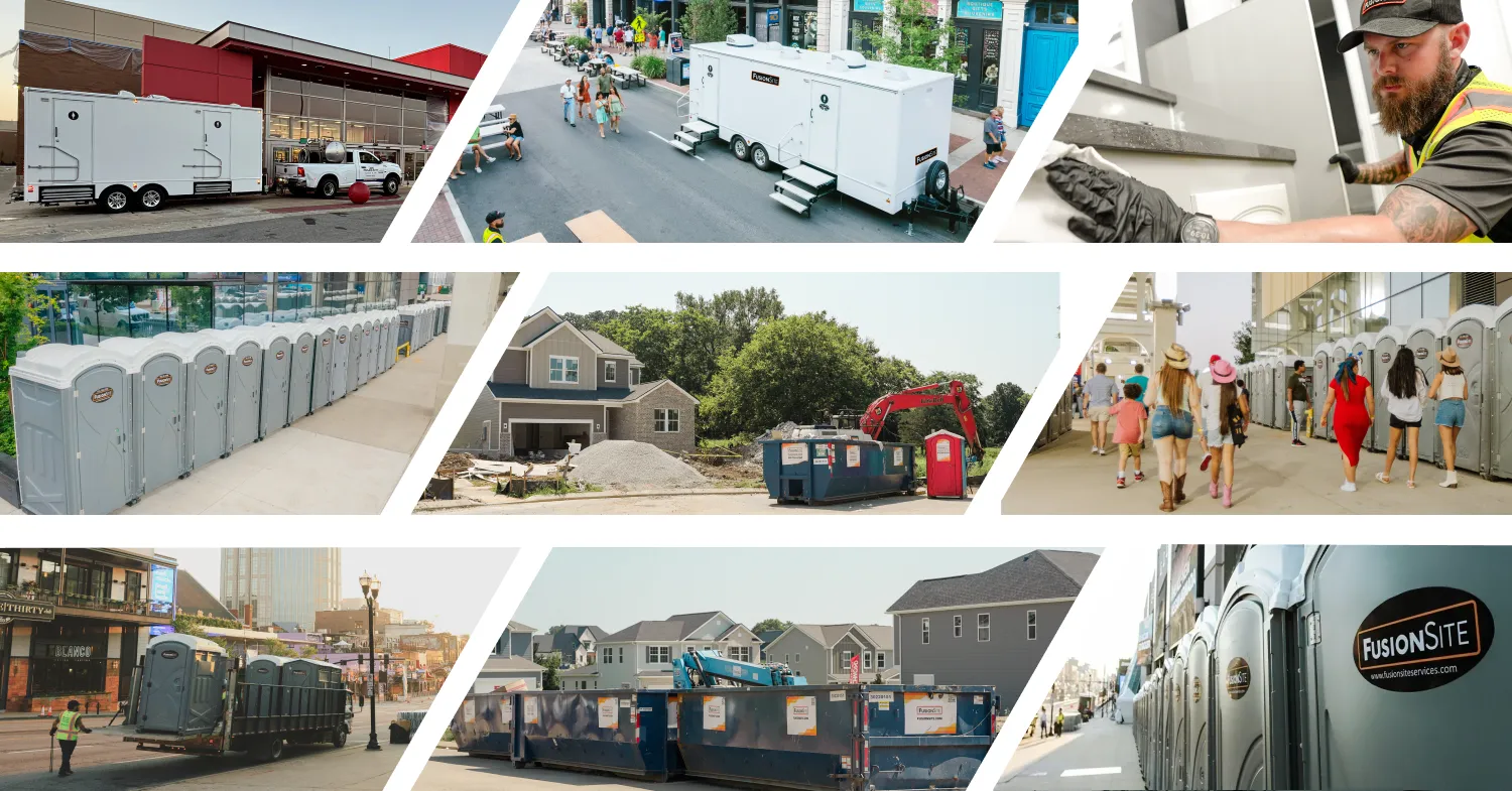 A row of gray portable restrooms is positioned along a sidewalk outside a modern glass building, with people walking nearby on a sunny day.
