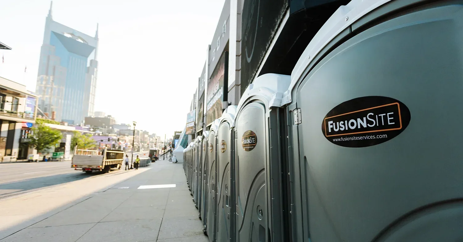 FusionSite portable toilets in a row by Bridgestone Arena in downtown Nashville.