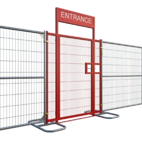A metal temporary fence with a red-framed entrance gate labeled “ENTRANCE,” designed for controlled pedestrian access at events.